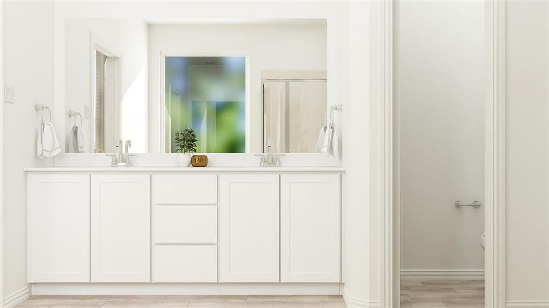 Bathroom featuring hardwood / wood-style floors and dual bowl vanity