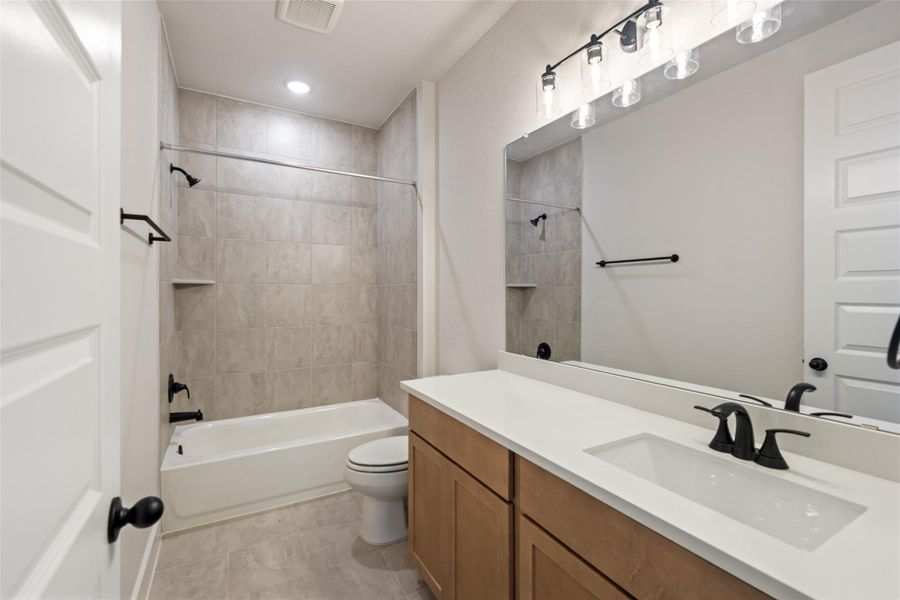 Furnished interior view inside a new home in Deer Pines, Conroe (Image 15).