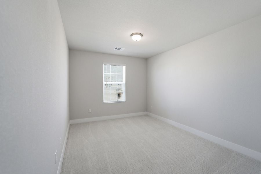 Spacious, unfurnished interior of a new home in Sunfield, Buda (Image 60).