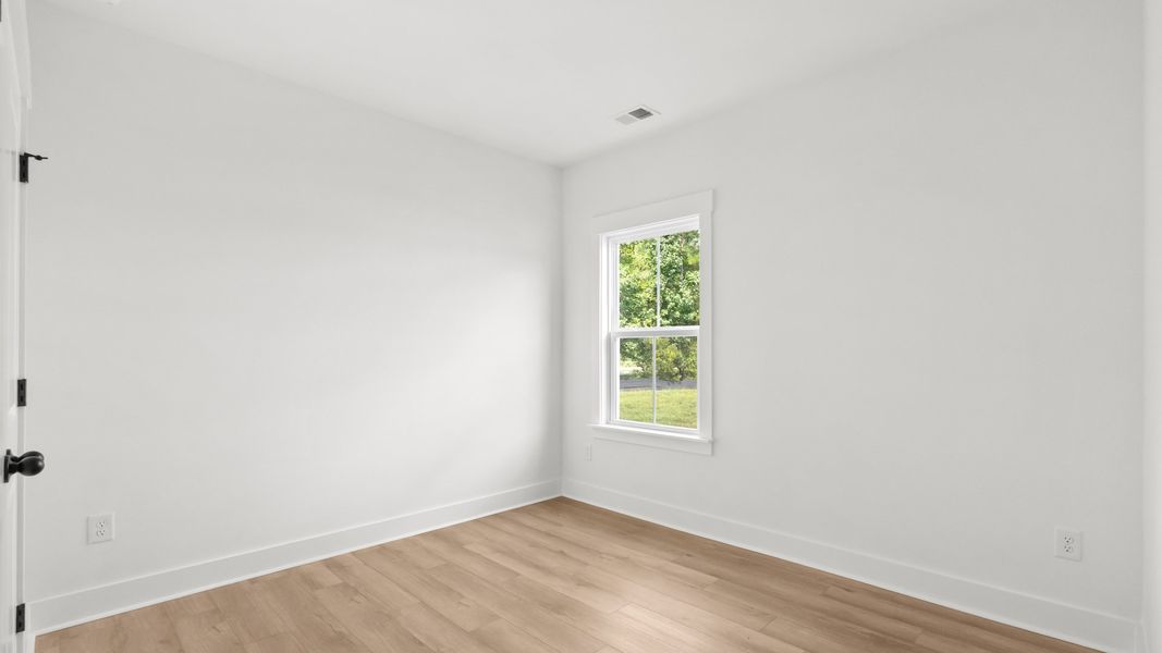 Furnished interior view inside a new home in Bluffs at Sun Colony, Longs (Image 20).