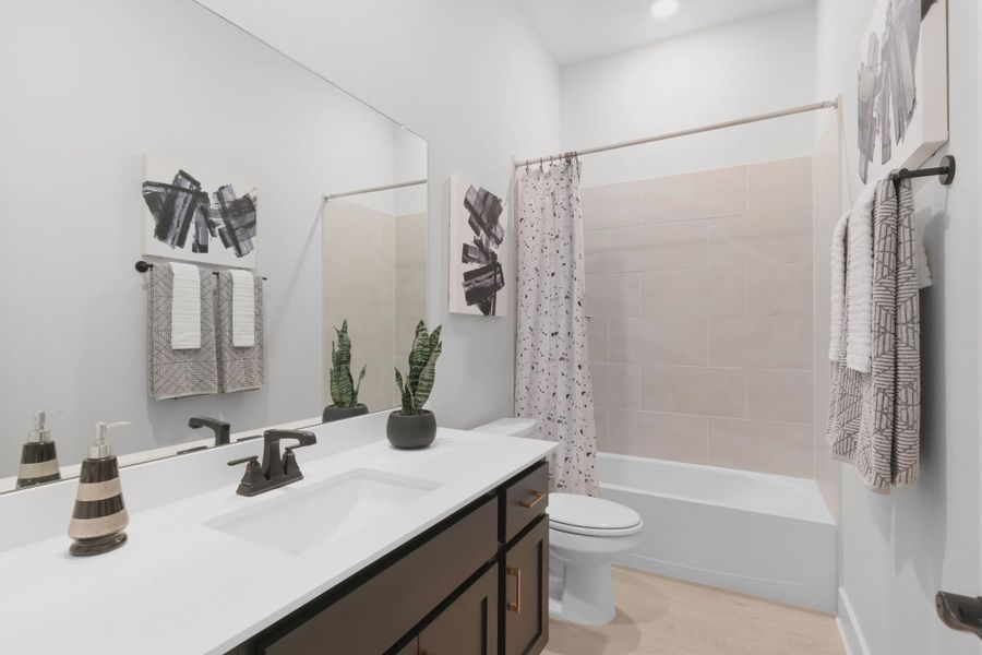 Representative furnished interior of a home built from the Sicily by Chesmar Homes in Berry Creek Highlands, Georgetown (Image 15).