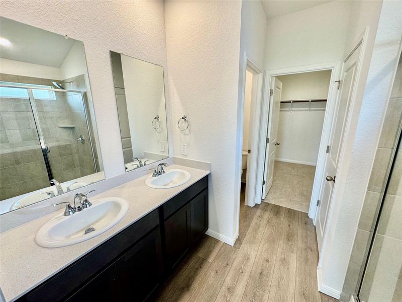 Furnished interior view inside a new home in Riverbend at Double Eagle - Reserve Collection, Cedar Creek (Image 4).