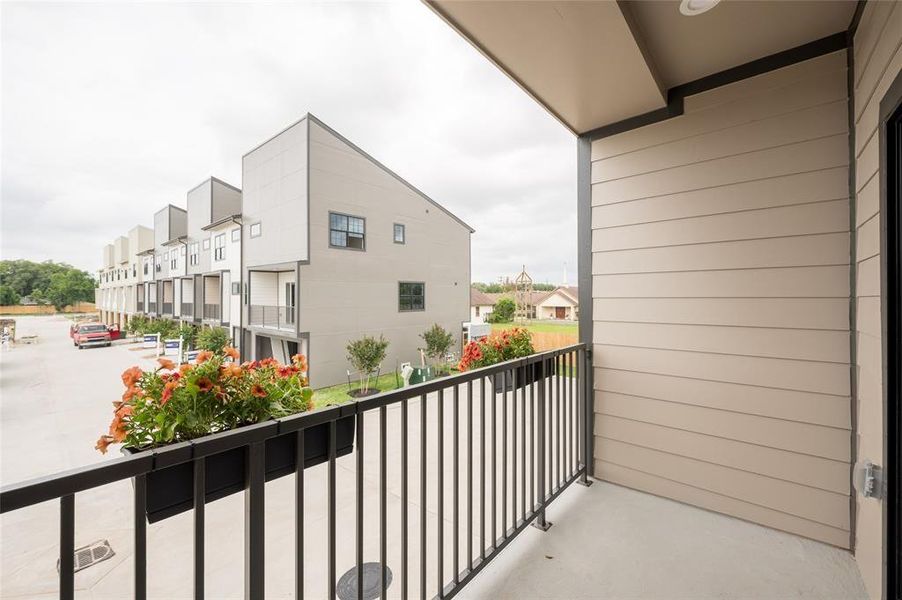 Private balcony offers a relaxing outdoor retreat to enjoy fresh air and neighborhood views. Private balcony offers a relaxing outdoor retreat to enjoy fresh air and neighborhood views.
