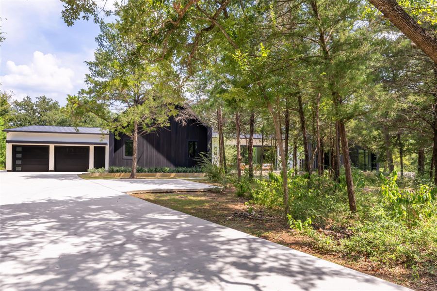 Front exterior of a new home in , College Station, TX, highlighting curb appeal (Image 25).