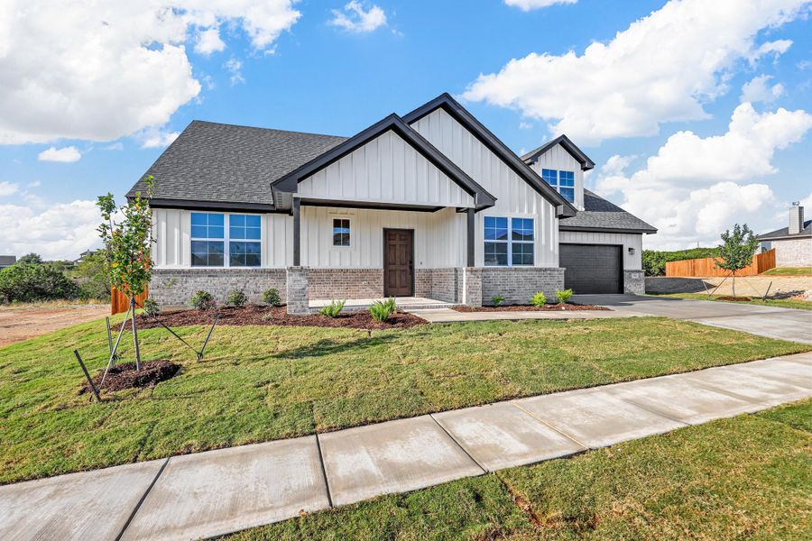 Representative exterior photo of a completed home built from the Garrison II by Cheldan Homes in Stoneview, Glen Rose, TX (Image 27).