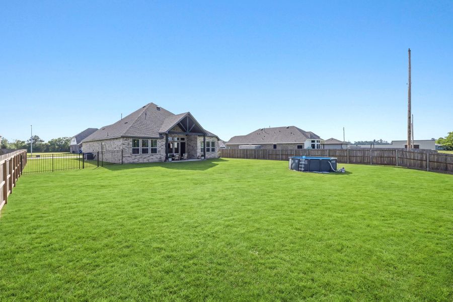 Exterior details and patio area of a home in , Old River-Winfree (Image 24).