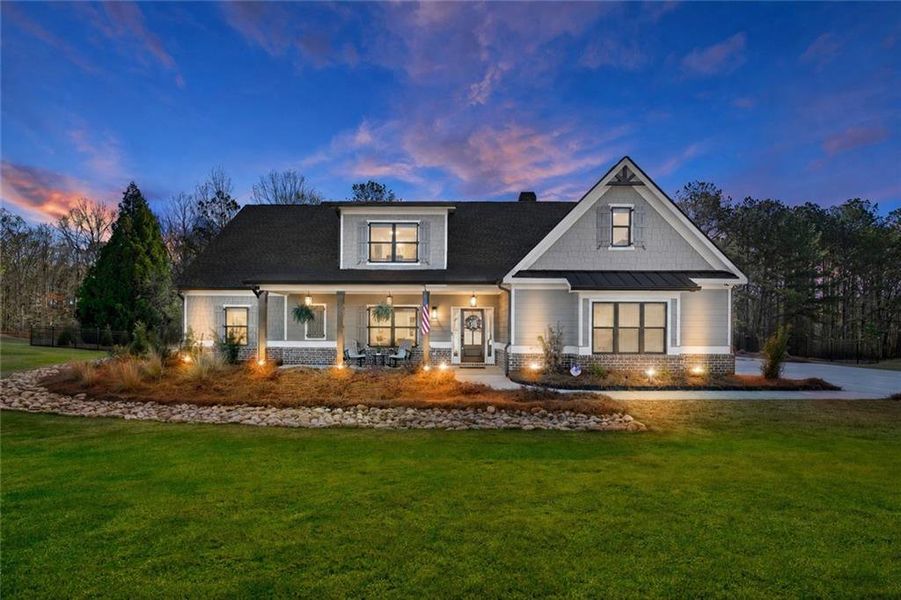 Front exterior of a new home in Stonegate, Monroe, GA, highlighting curb appeal (Image 28). Front exterior of a new home in Stonegate, Monroe, GA, highlighting curb appeal (Image 28).