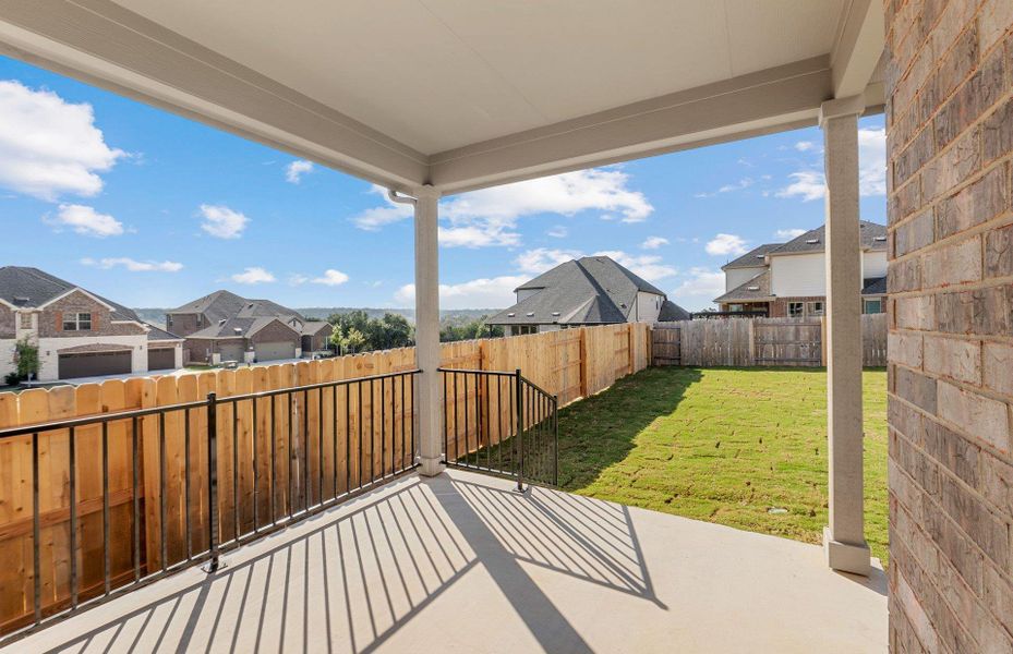 Exterior details and patio area of a home in Crescent Bluff, Georgetown (Image 2).