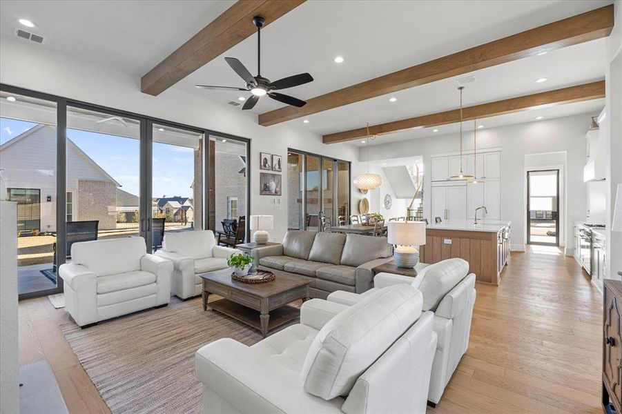 Family room opens onto covered patio and overlooks the cabana