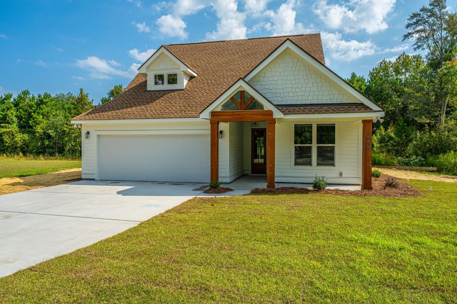 Front exterior of a new home in , McClellanville, SC, highlighting curb appeal (Image 1).