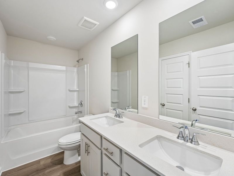 Furnished interior view inside a new home in Hemingway - Highland Series, Cumming (Image 13).