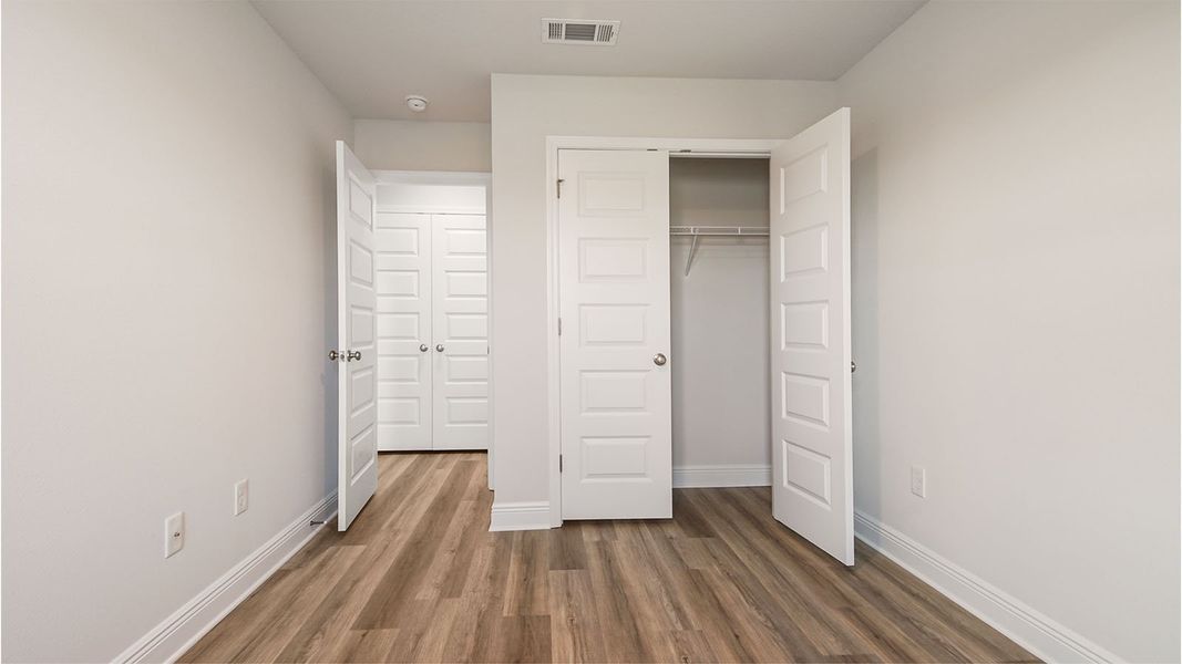Representative unfurnished interior of a home built from the Palm Interior by D.R. Horton in Caballeros Estates Townhomes at Hombre, Panama City Beach (Image 35). Representative unfurnished interior of a home built from the Palm Interior by D.R. Horton in Caballeros Estates Townhomes at Hombre, Panama City Beach (Image 35).