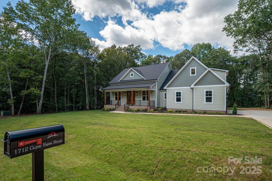Front exterior of a new home in , Lincolnton, NC, highlighting curb appeal (Image 27).
