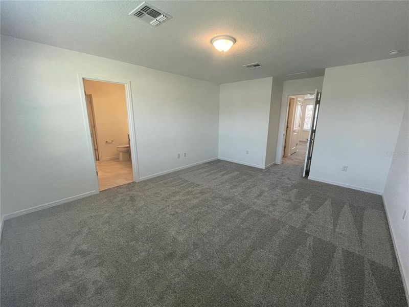 Spacious, unfurnished interior of a new home in Isles at BayView, Parrish (Image 18).