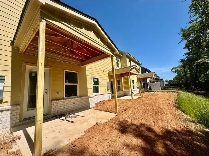 Exterior details and patio area of a home in Eastlyn Crossing, Flowery Branch (Image 3).