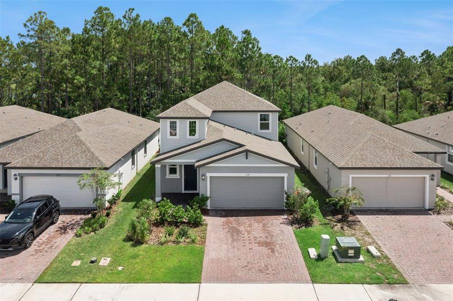 Front exterior of a new home in , Daytona Beach, FL, highlighting curb appeal (Image 27).
