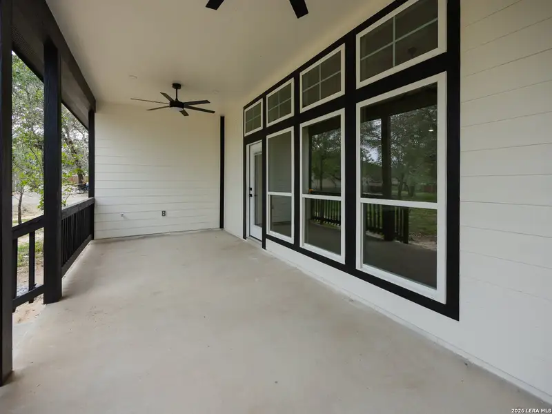 Exterior details and patio area of a home in , Elmendorf (Image 3). Exterior details and patio area of a home in , Elmendorf (Image 3).