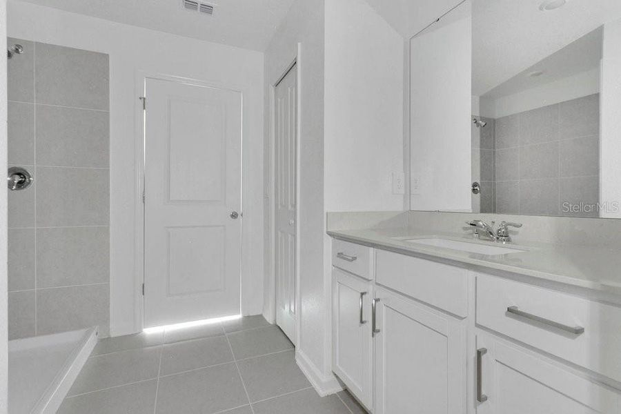 Furnished interior view inside a new home in Peace Creek Reserve, Winter Haven (Image 6).