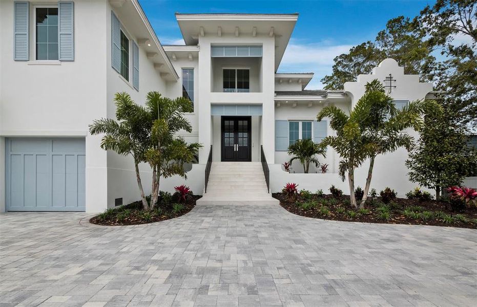 Front exterior of a new home in , Sarasota, FL, highlighting curb appeal (Image 2).