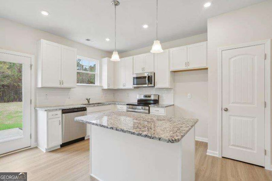 Furnished interior view inside a new home in Bryson Farms, Byron (Image 3).