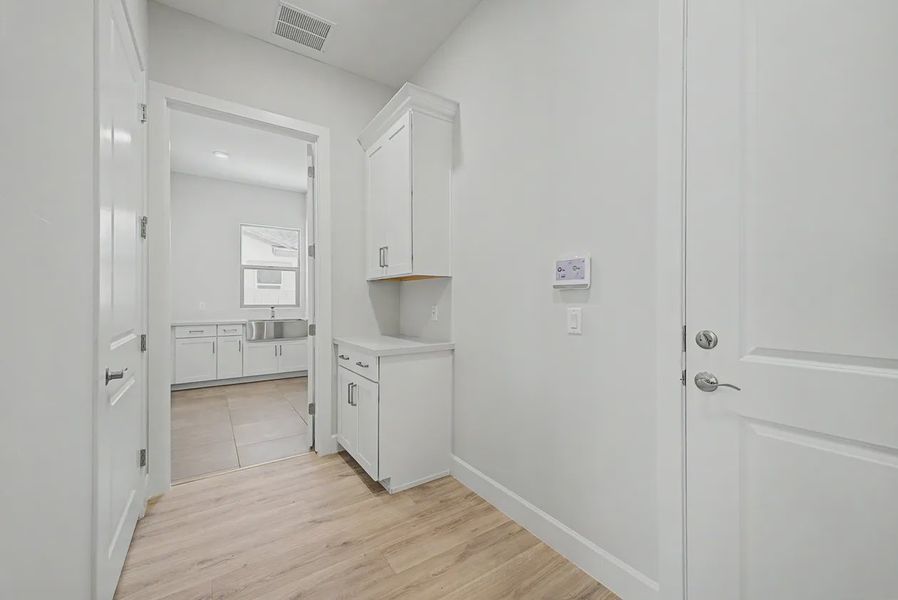 Spacious, unfurnished interior of a new home in Bellero Estates, Queen Creek (Image 30). Spacious, unfurnished interior of a new home in Bellero Estates, Queen Creek (Image 30).