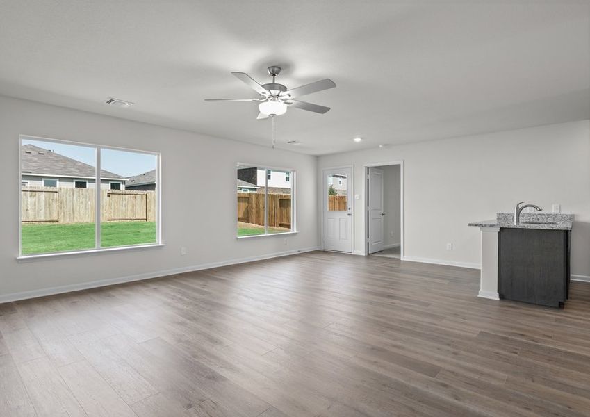 The family room and dining room have large windows that let in great, natural light.