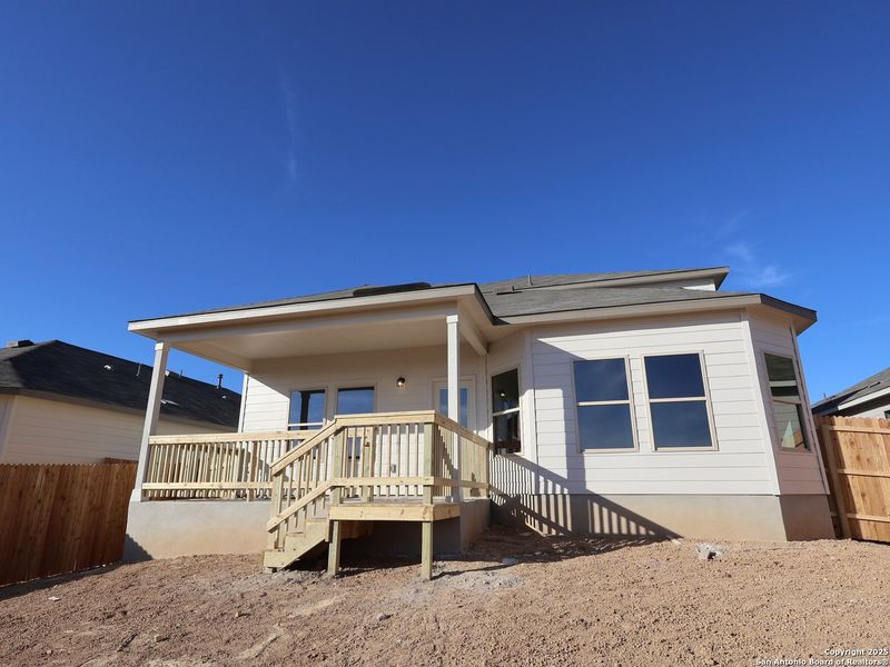 Exterior details and patio area of a home in Hunters Ranch, San Antonio (Image 23).