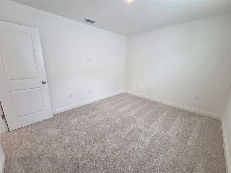 Spacious, unfurnished interior of a new home in Villamar, Winter Haven (Image 23).