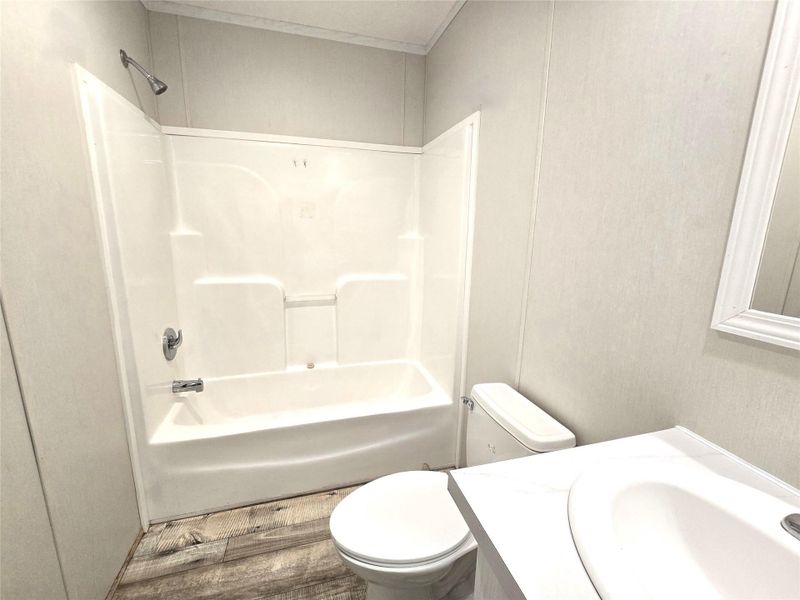Discover the convenience of this bright and inviting third bathroom, featuring a sleek tub-shower combo and modern fixtures, perfect for enhancing your daily routine. Discover the convenience of this bright and inviting third bathroom, featuring a sleek tub-shower combo and modern fixtures, perfect for enhancing your daily routine.