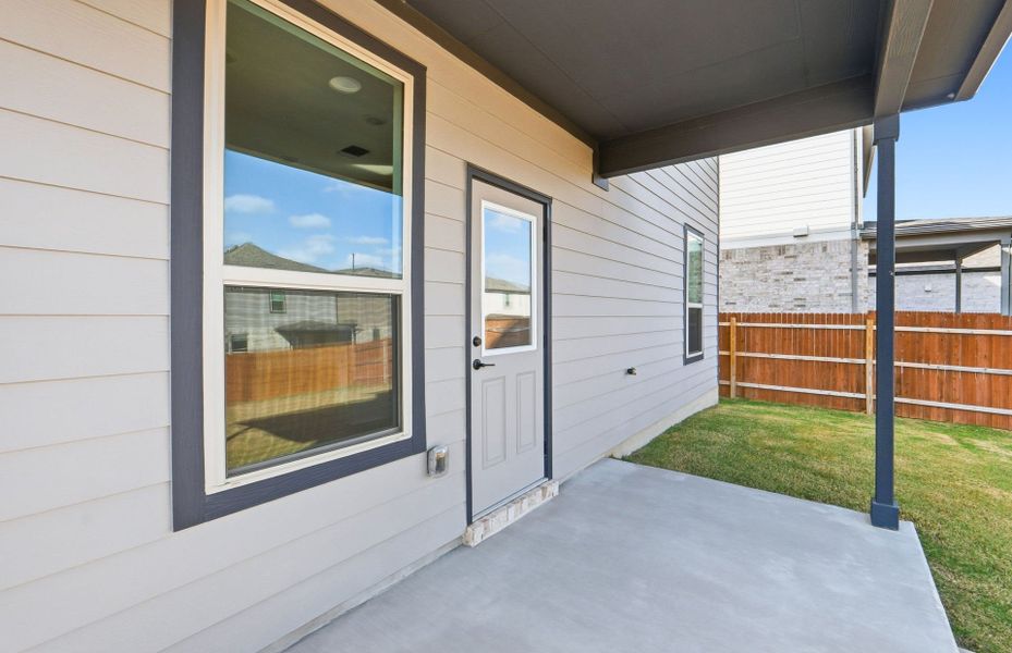 Exterior details and patio area of a home in Saddleback at Santa Rita Ranch, Liberty Hill (Image 26).