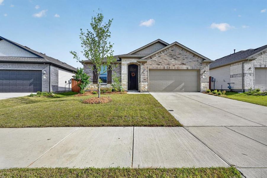 Front exterior of a new home in , Crandall, TX, highlighting curb appeal (Image 22).