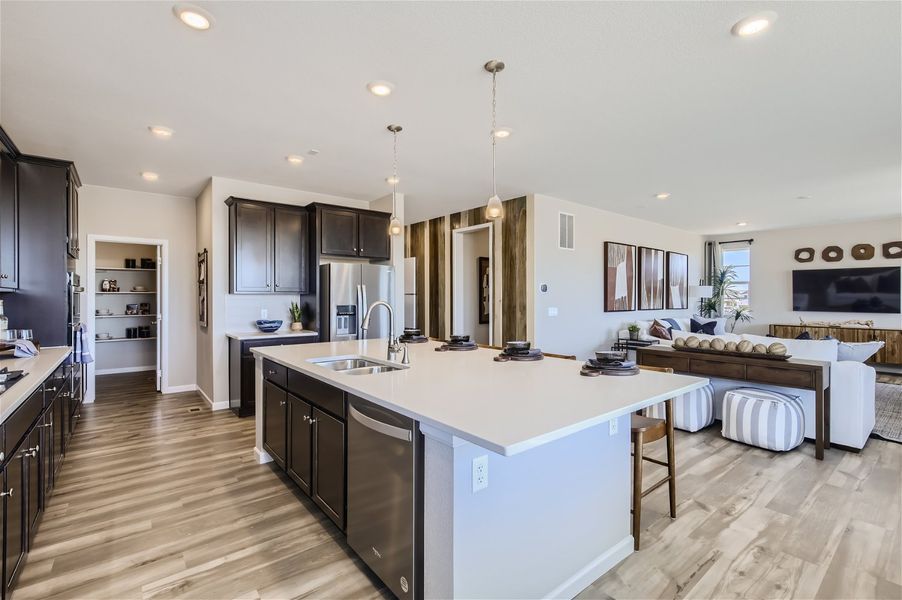 A kitchen with a large island. A kitchen with a large island.