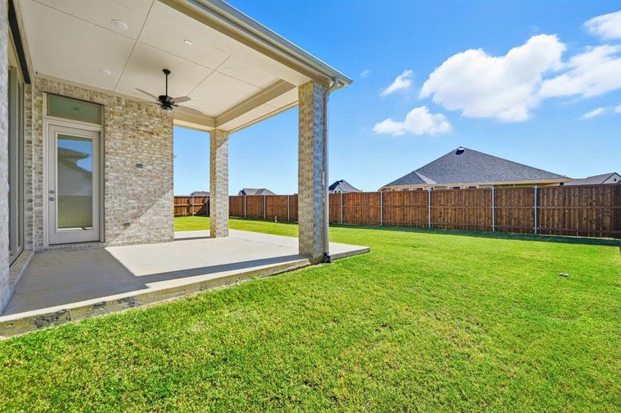 Exterior details and patio area of a home in Sandbrock Ranch: 60ft. lots, Aubrey (Image 1).