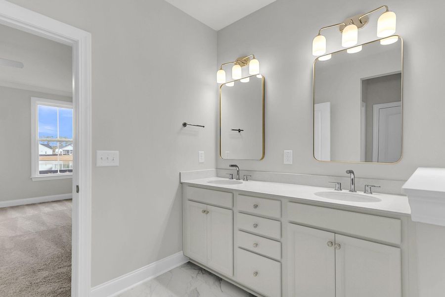 Furnished interior view inside a new home in Tidewater at Lakes of Cane Bay, Summerville (Image 8).