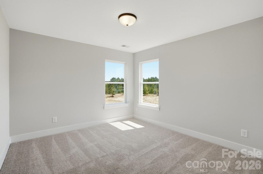 Spacious, unfurnished interior of a new home in Blythe Mill Townhomes, Waxhaw (Image 40).