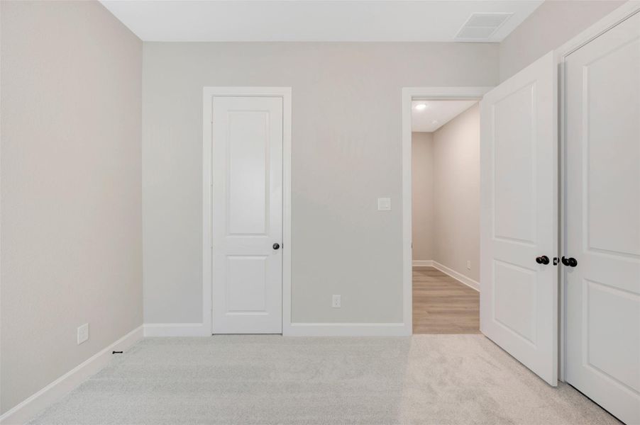 Spacious, unfurnished interior of a new home in Riceland - Summit Collection, Mont Belvieu (Image 11). Spacious, unfurnished interior of a new home in Riceland - Summit Collection, Mont Belvieu (Image 11).