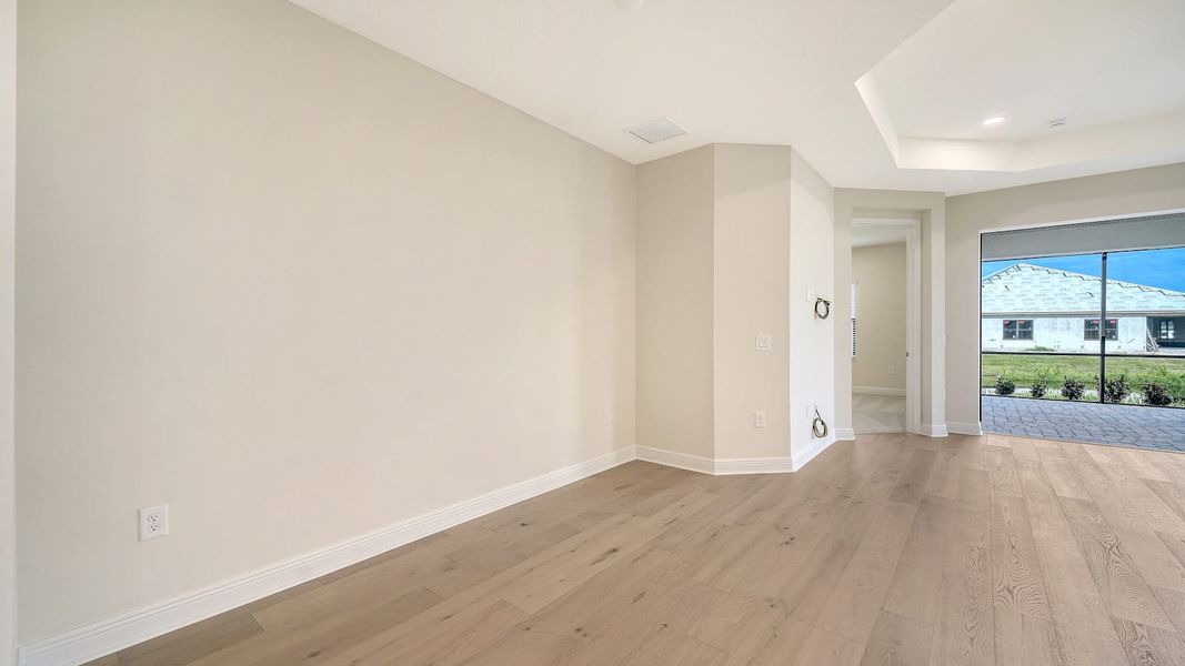 Spacious, unfurnished interior of a new home in Vistera of Venice Real Estate and Homes for Sale in Venice, FL - Neal Communities, Nokomis (Image 24).