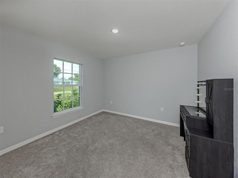 Spacious, unfurnished interior of a new home in , Port Charlotte (Image 22).