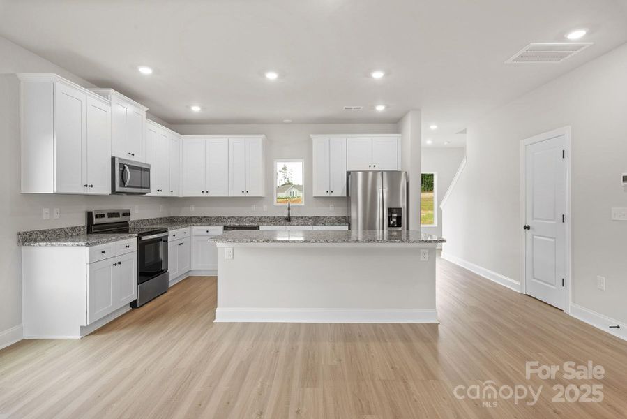 Furnished interior view inside a new home in Ascot Woods, Charlotte (Image 6).