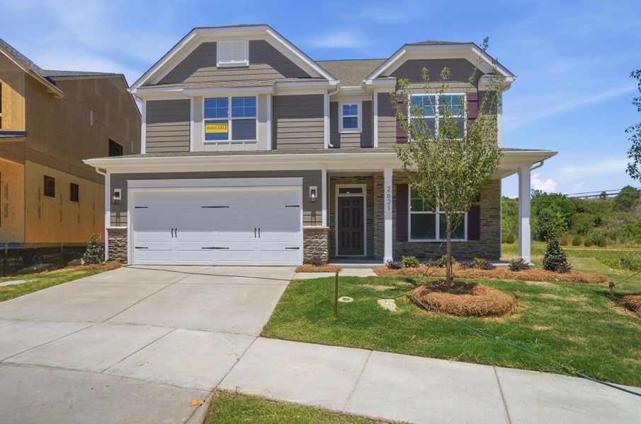 Front exterior of a new home in Ashton Park, Monroe, NC, highlighting curb appeal (Image 1). Front exterior of a new home in Ashton Park, Monroe, NC, highlighting curb appeal (Image 1).