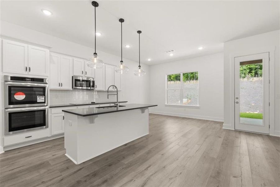 Furnished interior view inside a new home in Traditions of Braselton, Jefferson (Image 4).
