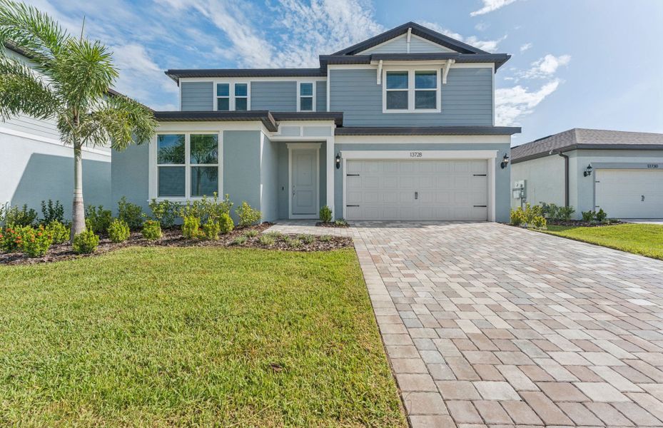 Representative exterior photo of a completed home built from the Ruby by Pulte Homes in Grandura, Sarasota, FL (Image 25).