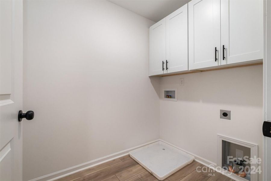 Representative Photo. Upstairs laundry room