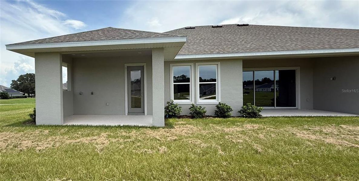 Front exterior of a new home in , Ocala, FL, highlighting curb appeal (Image 5).