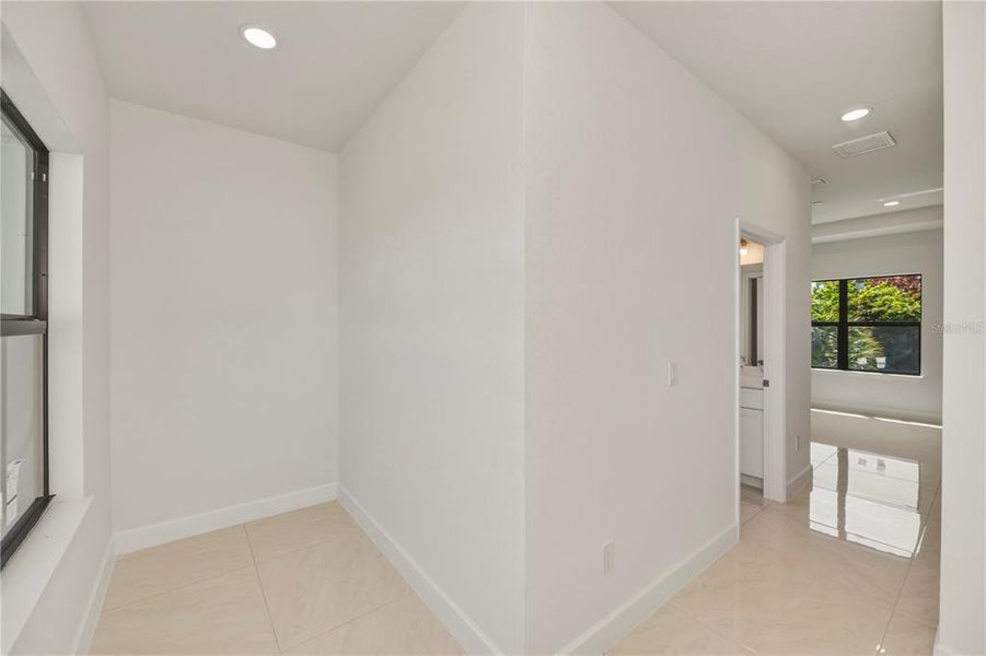 Spacious, unfurnished interior of a new home in , Port Charlotte (Image 24).