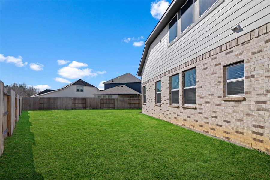 Exterior details and patio area of a home in Emory Glen, Magnolia (Image 20).