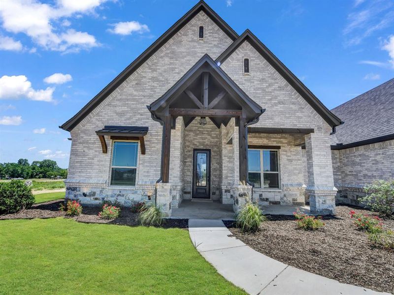Front exterior of a new home in , Weatherford, TX, highlighting curb appeal (Image 22). Front exterior of a new home in , Weatherford, TX, highlighting curb appeal (Image 22).