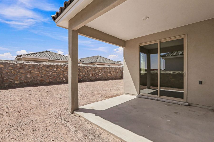 Exterior details and patio area of a home in Paseos Del Este, El Paso (Image 36).