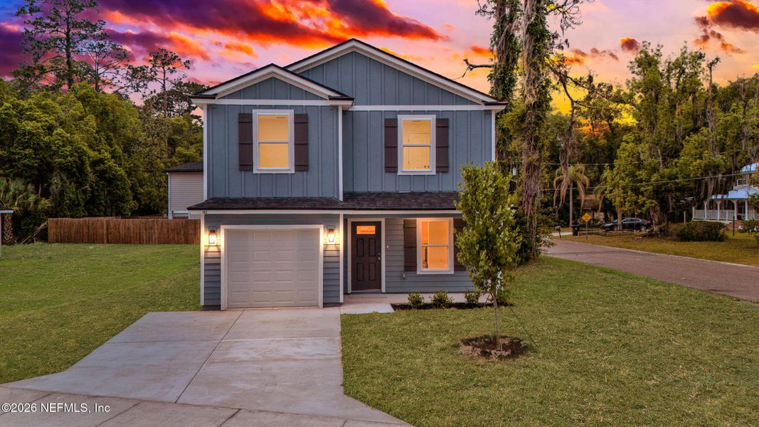 Front exterior of a new home in , Green Cove Springs, FL, highlighting curb appeal (Image 26). Front exterior of a new home in , Green Cove Springs, FL, highlighting curb appeal (Image 26).