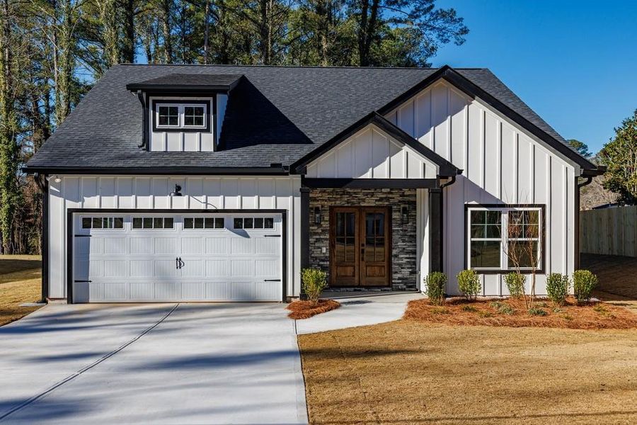 Front exterior of a new home in , Carrollton, GA, highlighting curb appeal (Image 29).